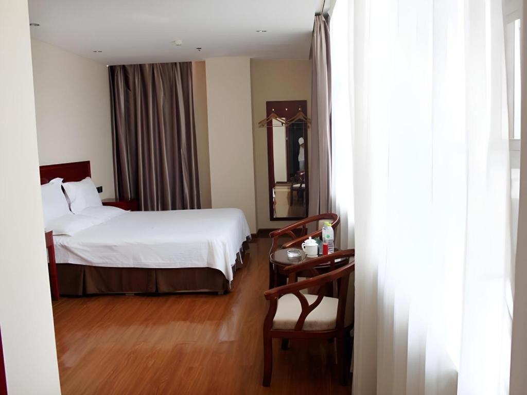 Greentree Inn Jining Yanzhou Jiuzhou Fangyuan Business Hotel Bagian luar foto