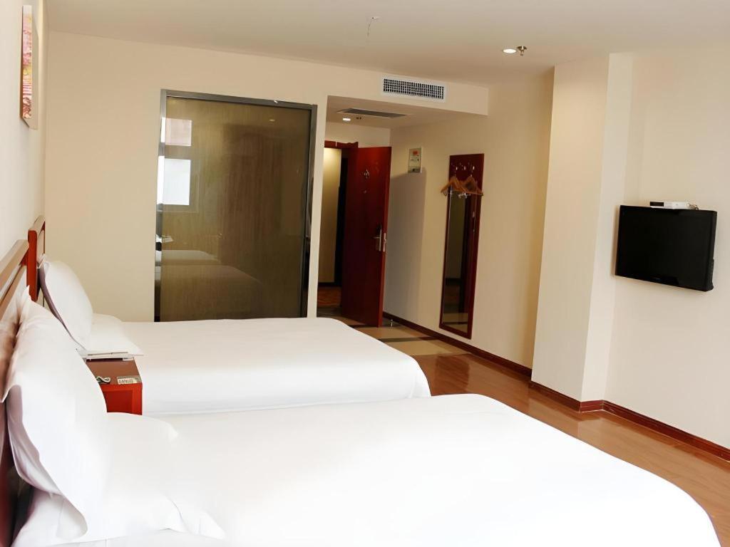 Greentree Inn Jining Yanzhou Jiuzhou Fangyuan Business Hotel Bagian luar foto